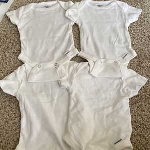 4 white cotton newborn onesies (bundle)